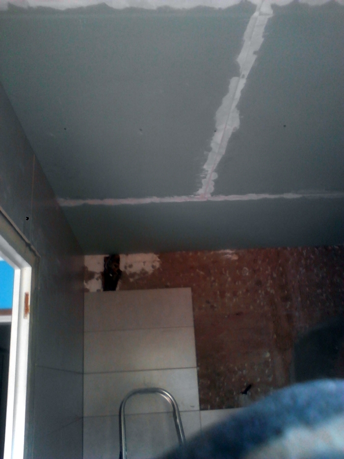 enmasillando el techo