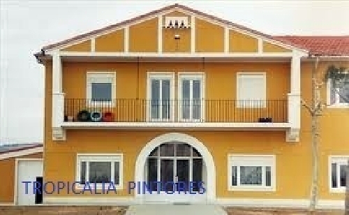 fachada al silicato ocre