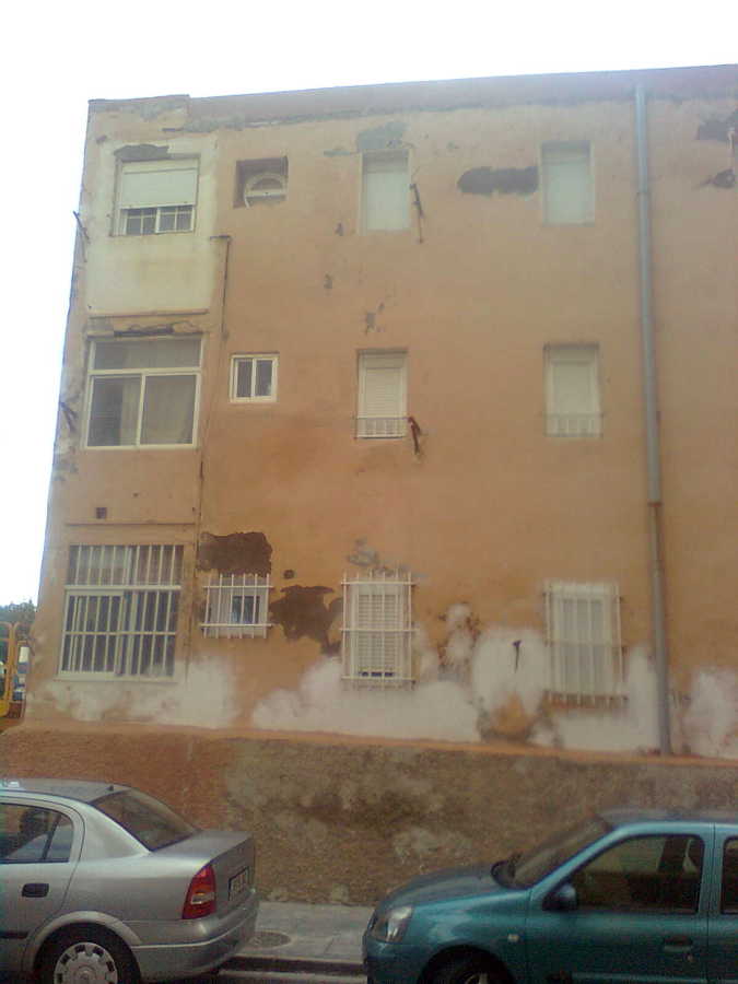 fachada cominidad de vecinos del zapillo