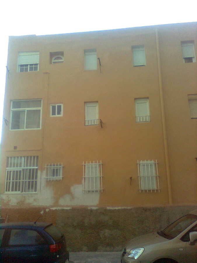 fachada cominidad de vecinos del zapillo