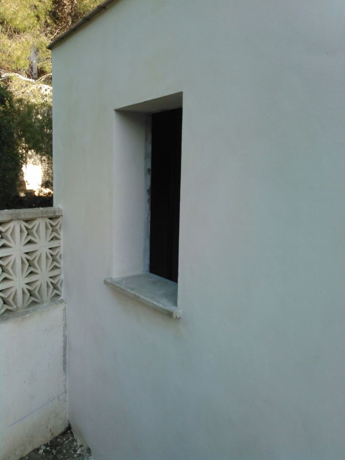 Enlucido de mortero fino