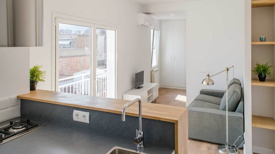 Reforma en Sarrià - Cocina americana vista cruzada 1