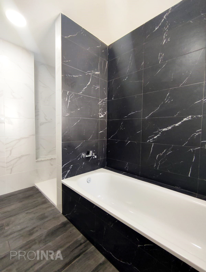 Baño estilo amarmolado