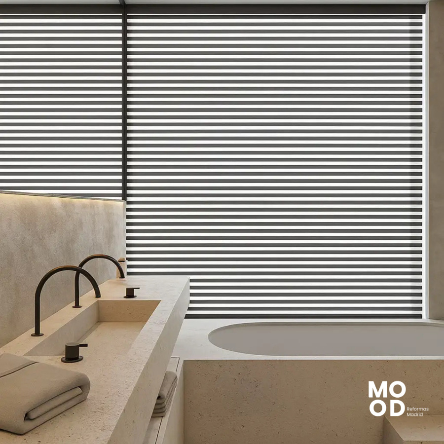 Diseño que Relaja: Tina y Lavamanos con Efecto Pétreo y Ambiente Acogedor