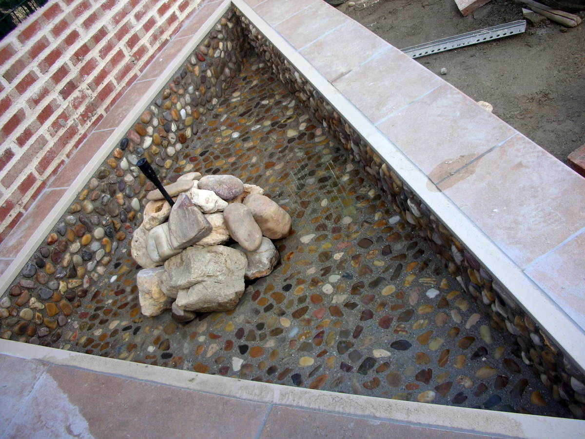 fuente de agua de obra en chalet