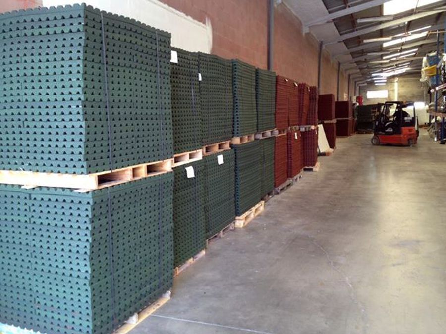 Gran stock de losetas de caucho