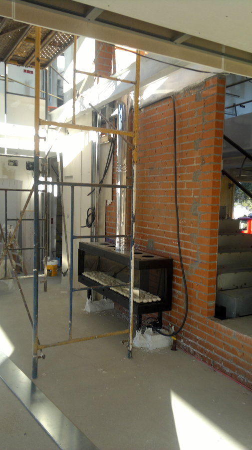 HOGAR LATERAL DE GAS DE LA CASA AMBIFUEGO