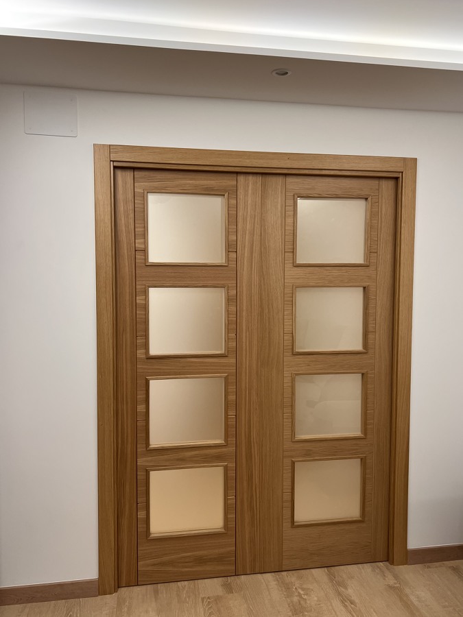 Puerta corredera doble