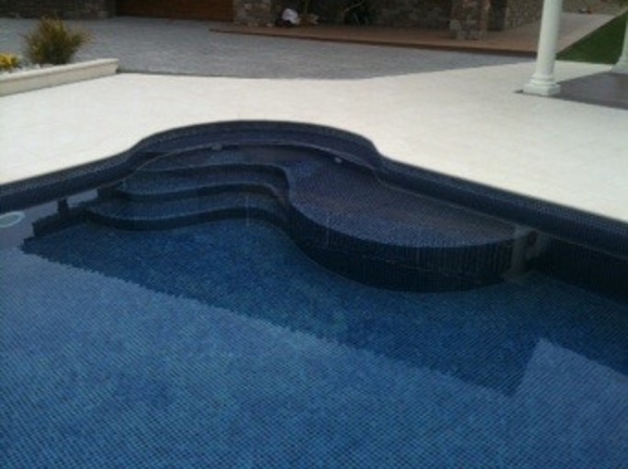 Piscina: accés i descnas