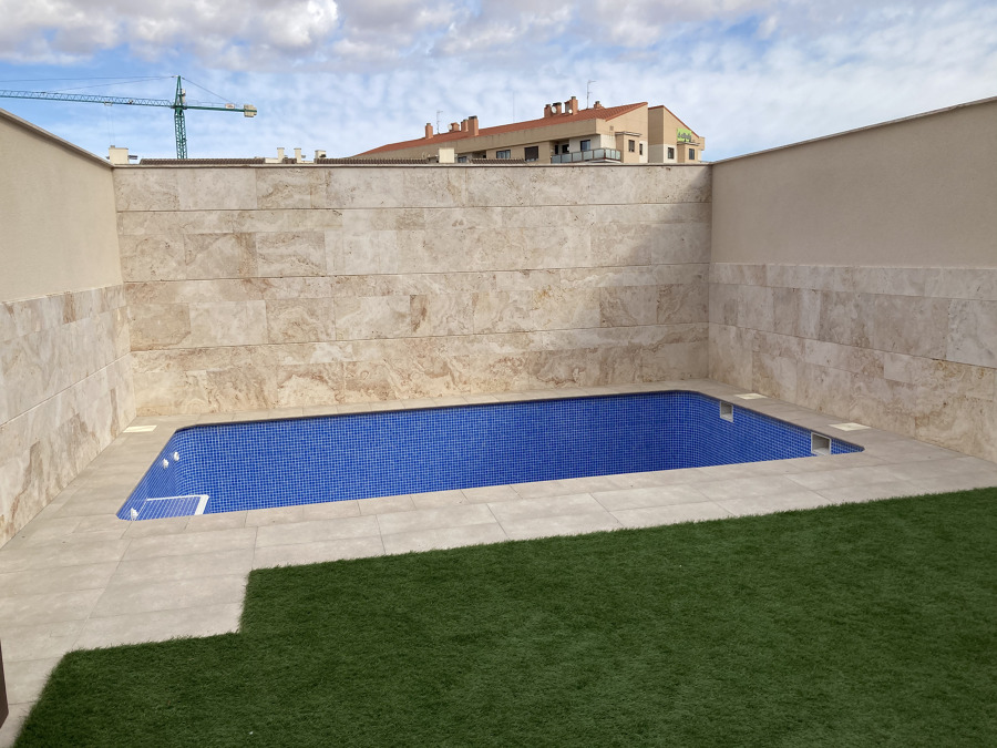 Piscina en adosado Unifamiliar