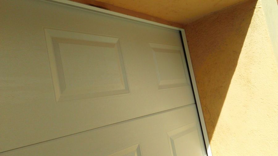 Puerta de cuarteron blanco