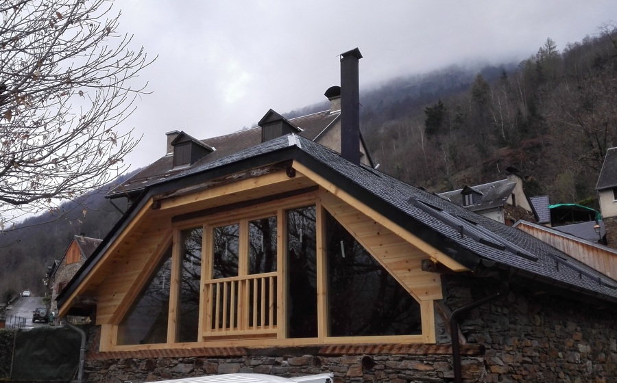 Balcón cristalera tejado