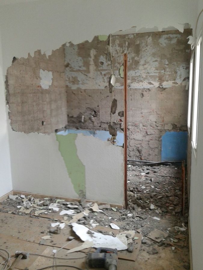 demolición de cosina