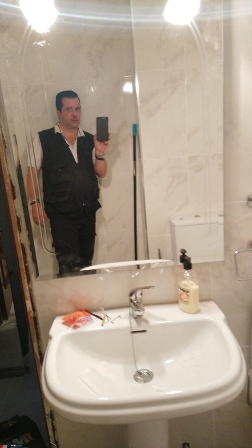 Reforma.baño con instalacion de accesorios 