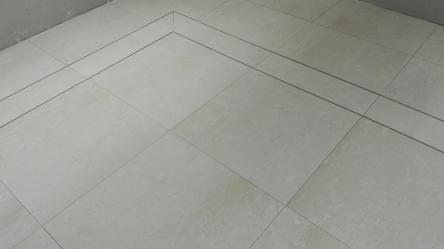 Obra maestra alfombra de marmol con junquillo de latón