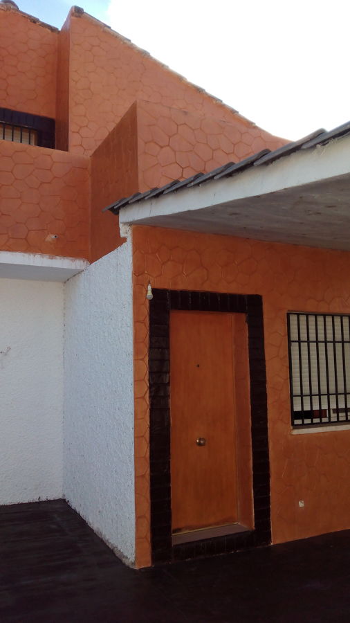 Construcción de terraza y revestimiento fachada