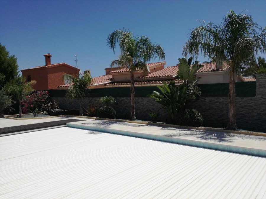 Piscina con cubierta automatica