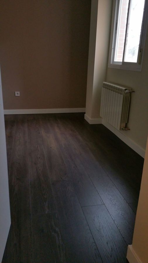 Tarima flotante AC5 y Alisado de paredes