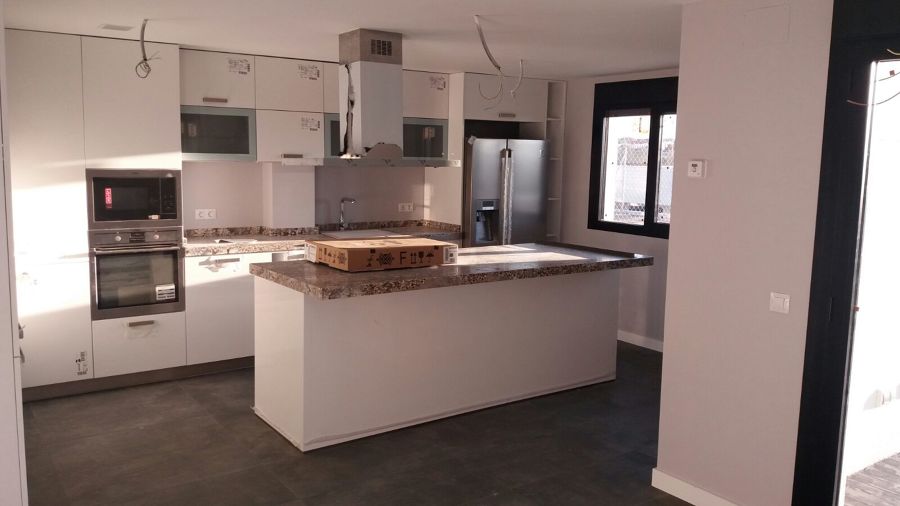 COCINA AMERICANA EN VIVIENDA UNIFAMILIAR