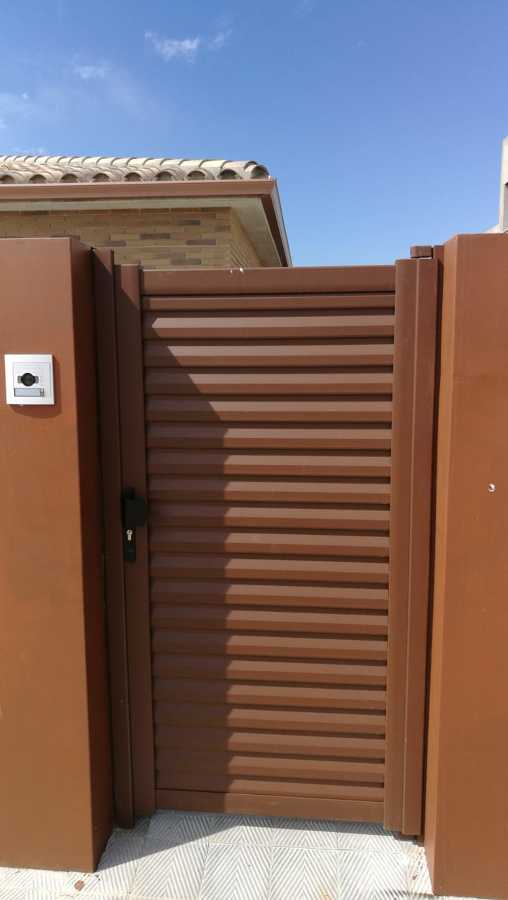 Puerta Cancela de lamas de aluminio