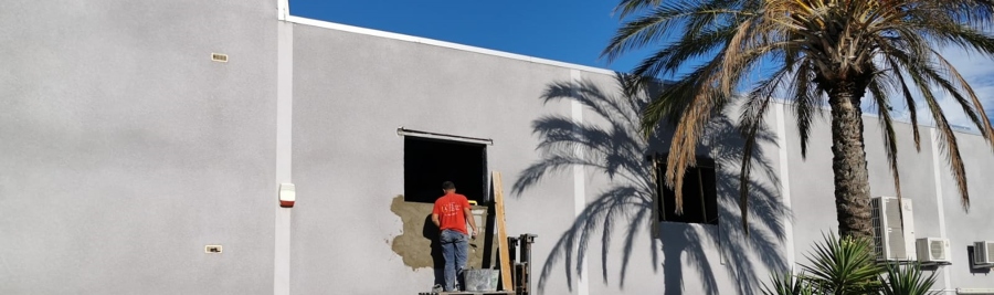 Reparación fachada y agrandamiento de ventanas