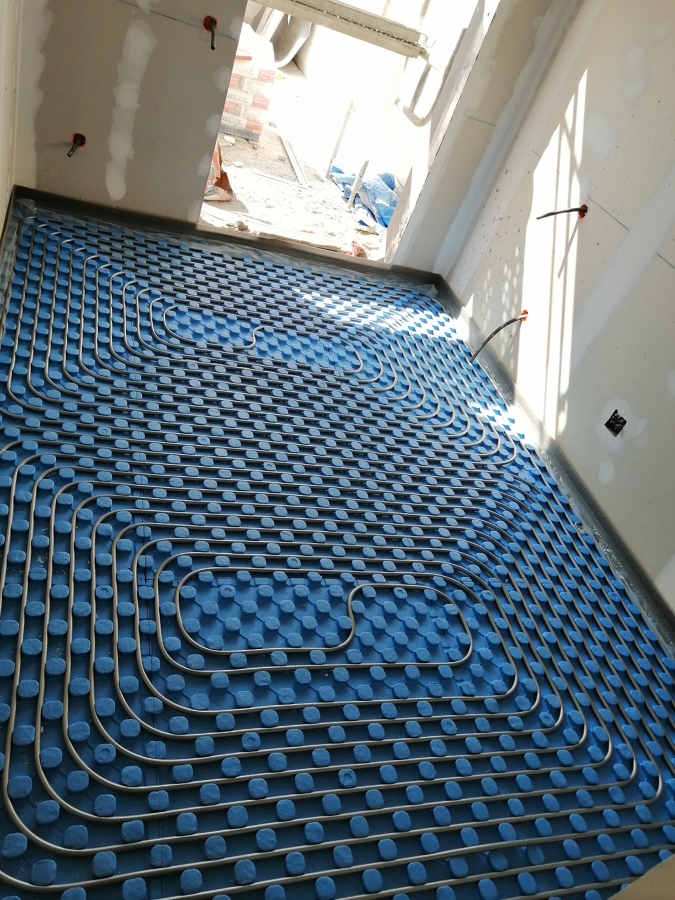 Calefacción/Refrigeración por Suelo Radiante.