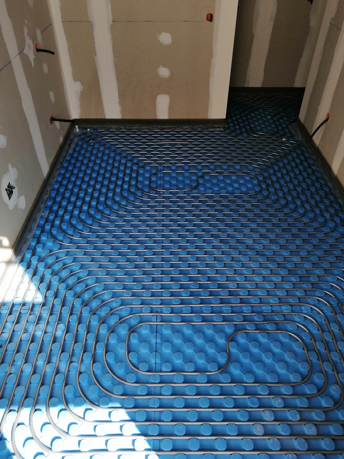 Calefacción/Refrigeración por Suelo Radiante.