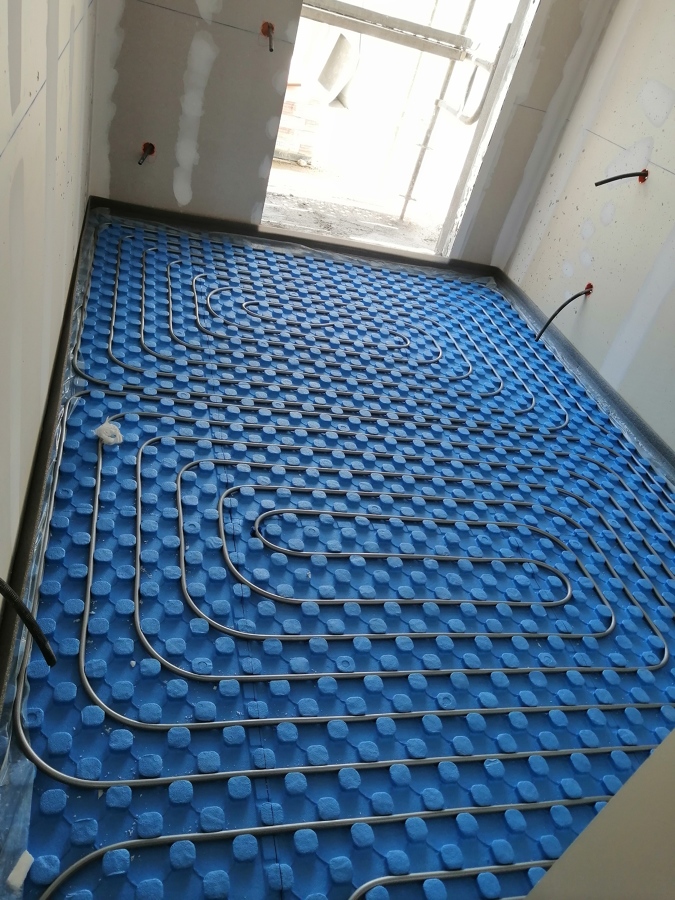 Calefacción/Refrigeración por Suelo Radiante.