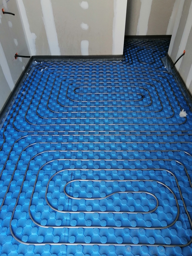 Calefacción/Refrigeración por Suelo Radiante.