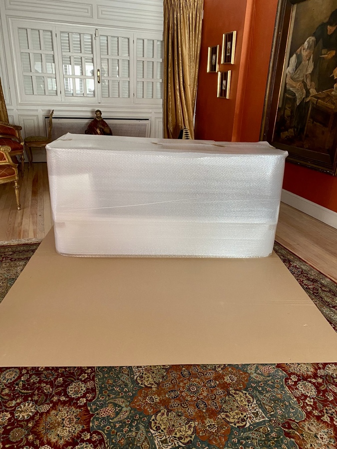 EMBALAJE CON BURBUJA Y CARTÓN