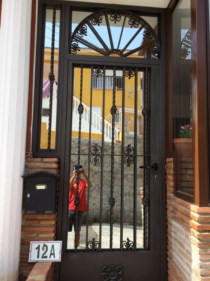 PUERTA FORJA CON CRISTAL ESPEJO 