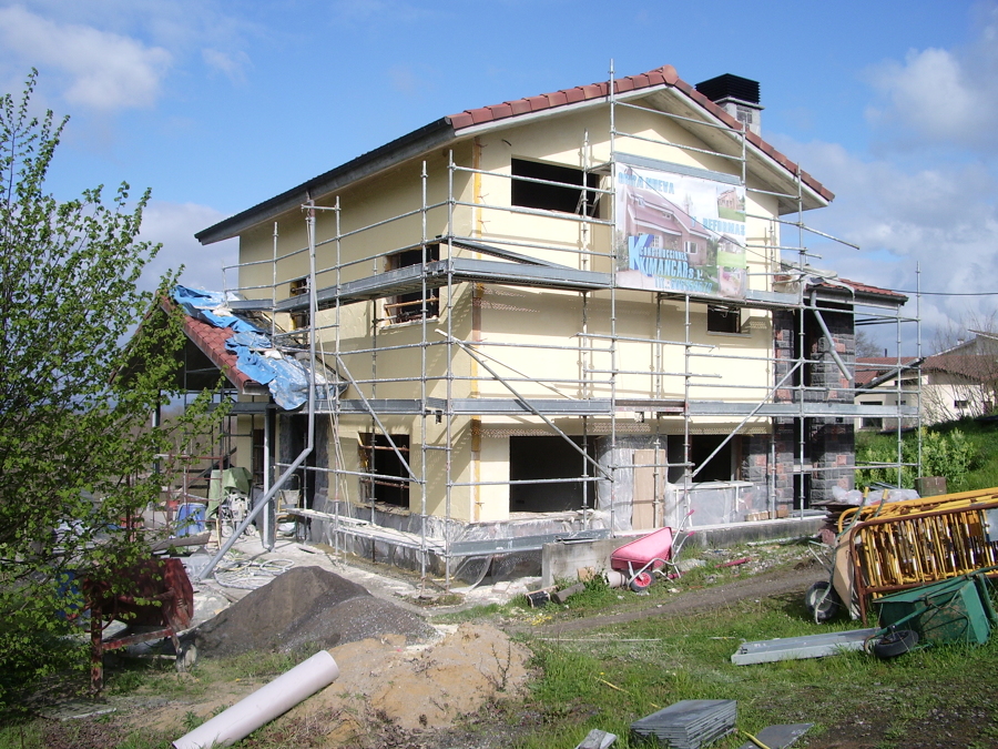 Fachada de aislamiento de aislone mortero termo-aislante de Weber y piedra