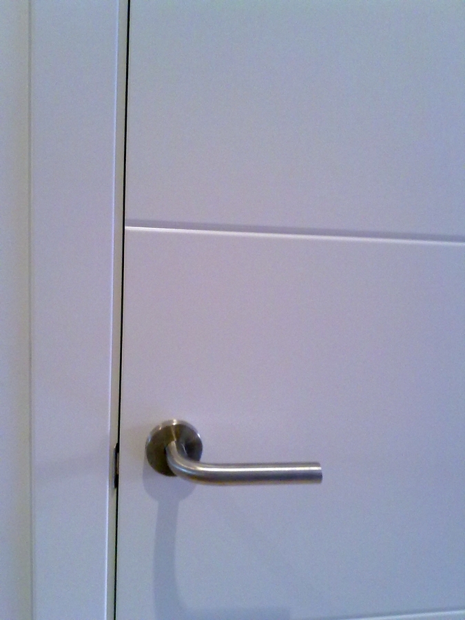 Manilla en L con roseta cromada