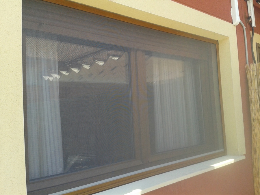 MOSQUITERAS ENRROLLABLES