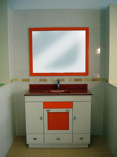 Mueble encimera de cristal naranja