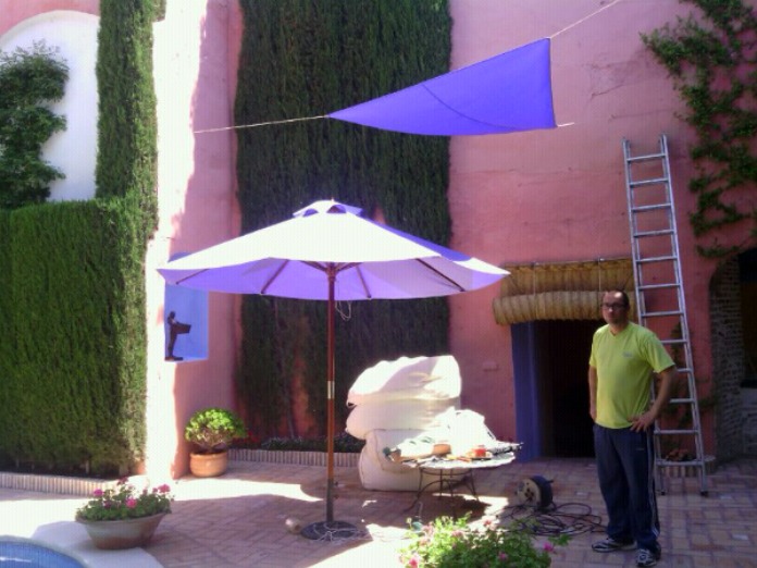 Paraguas y toldo a medida.