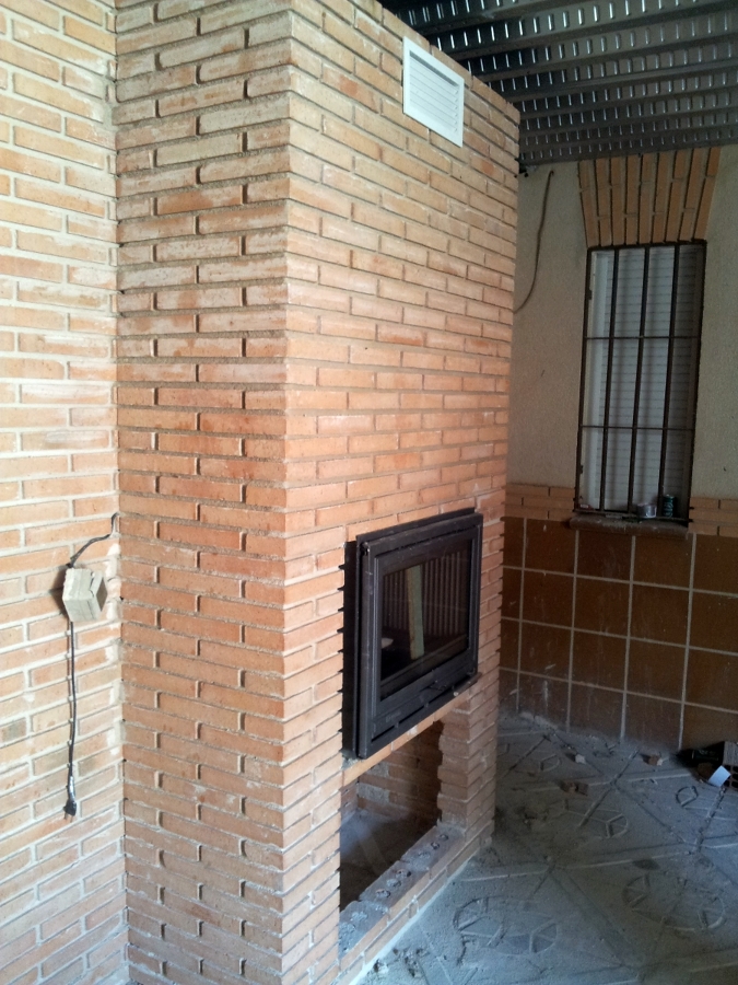 pared de ladrillo visto con casete