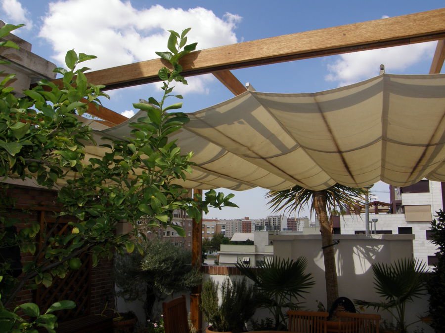 Pergola y toldos en un atico en Murcia