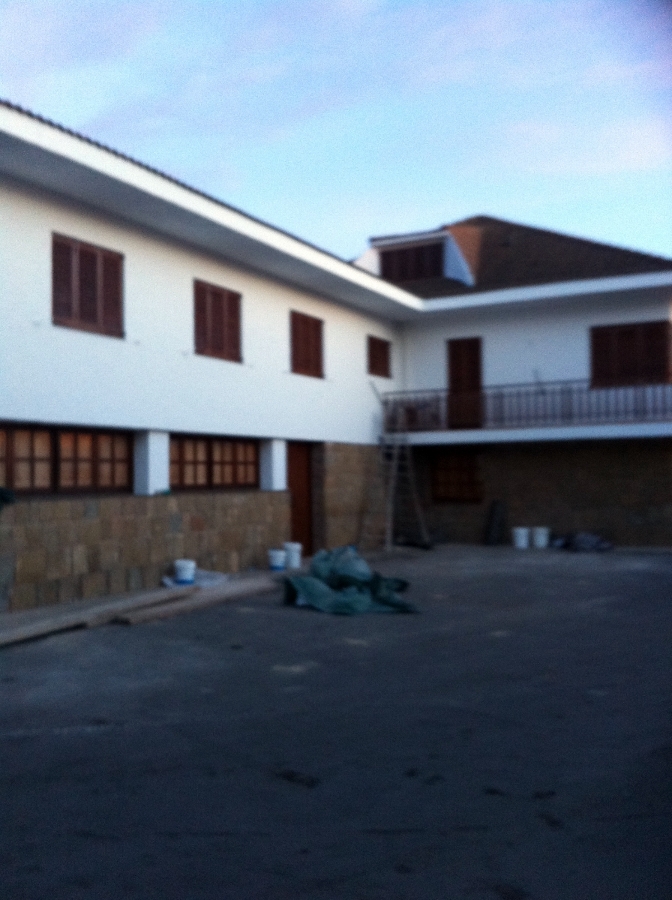 pintado de fachada y barnizdo de ventanas