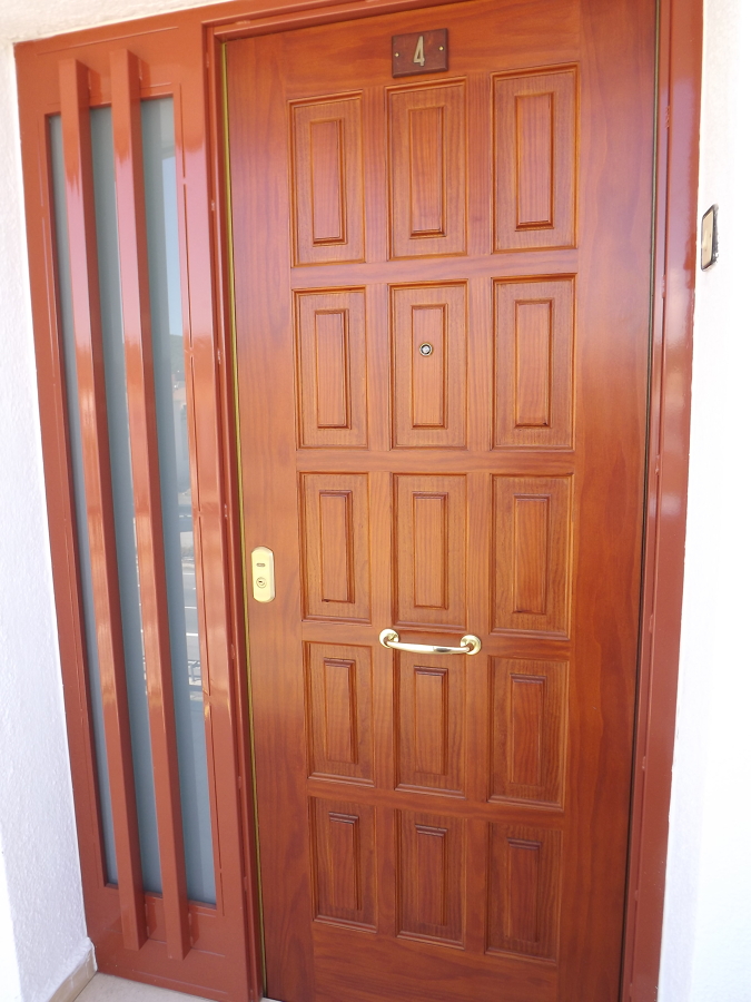 puerta acorazada con fijo lateral