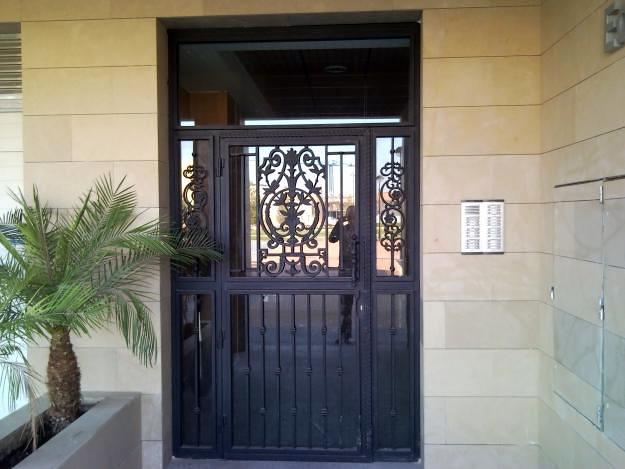 puerta de entrada forja-cristal