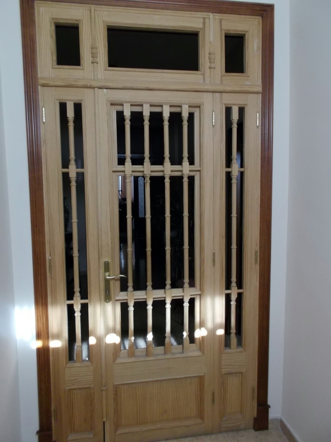 Puerta de entrada, portillo, torneado