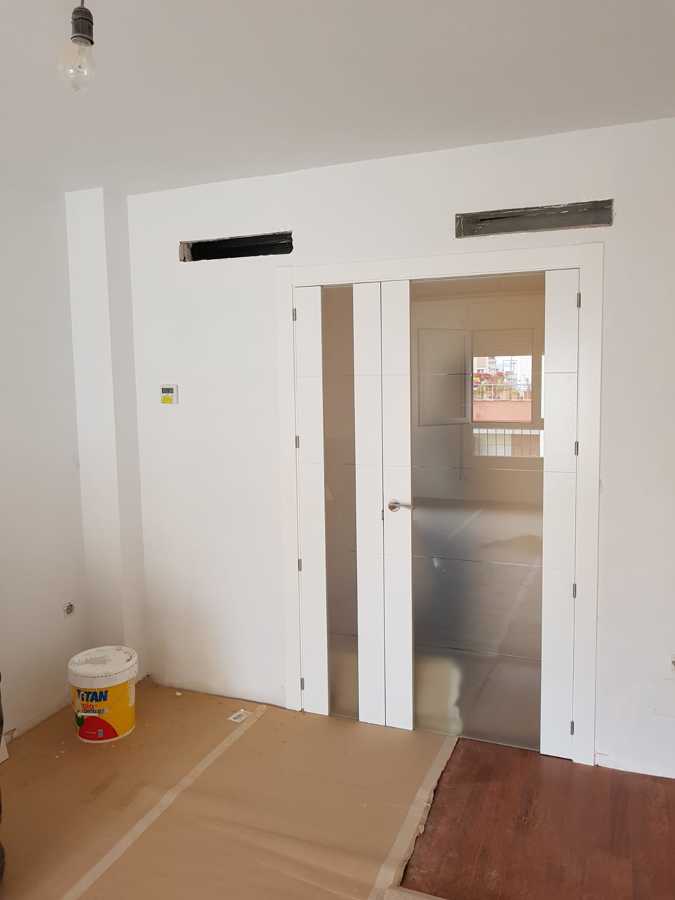 Puerta de paso doble