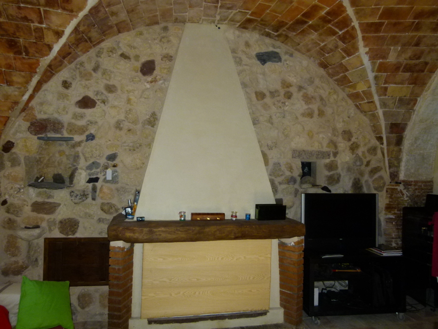 Reconstrucción de casa de piedra de más de 700 años