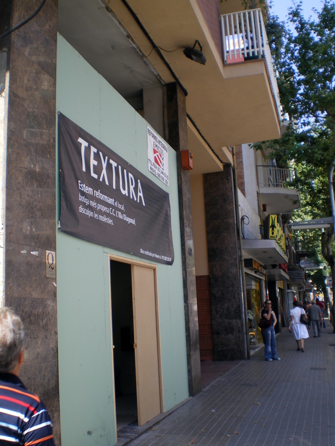 Rehabilitación fachada tienda TEXTURA