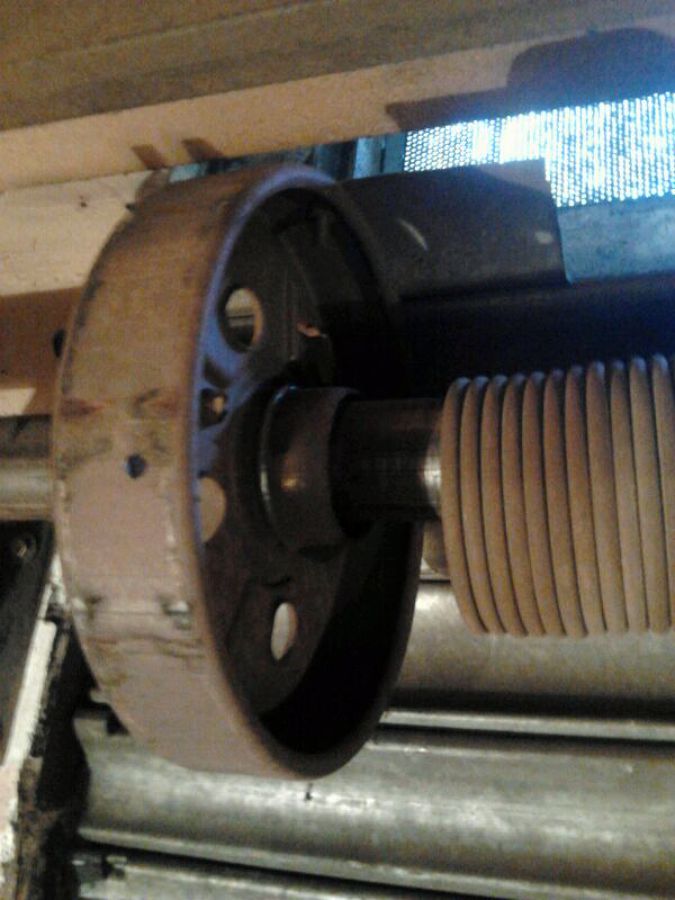 Reparación muelle puerta 