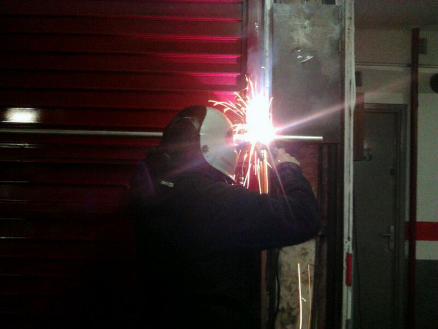 Reparación puerta garaje comunitario