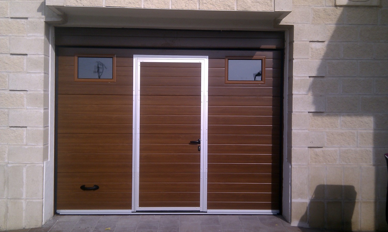Sustitucion de puerta enrollable de cochera por Puerta Seccional(2)