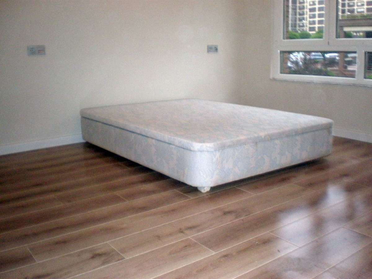 TARIMA FLOTANTE EN HABITACION