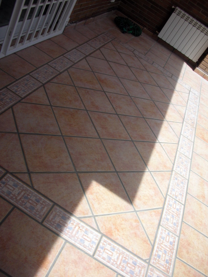 Terminacion de alfombra con gres..